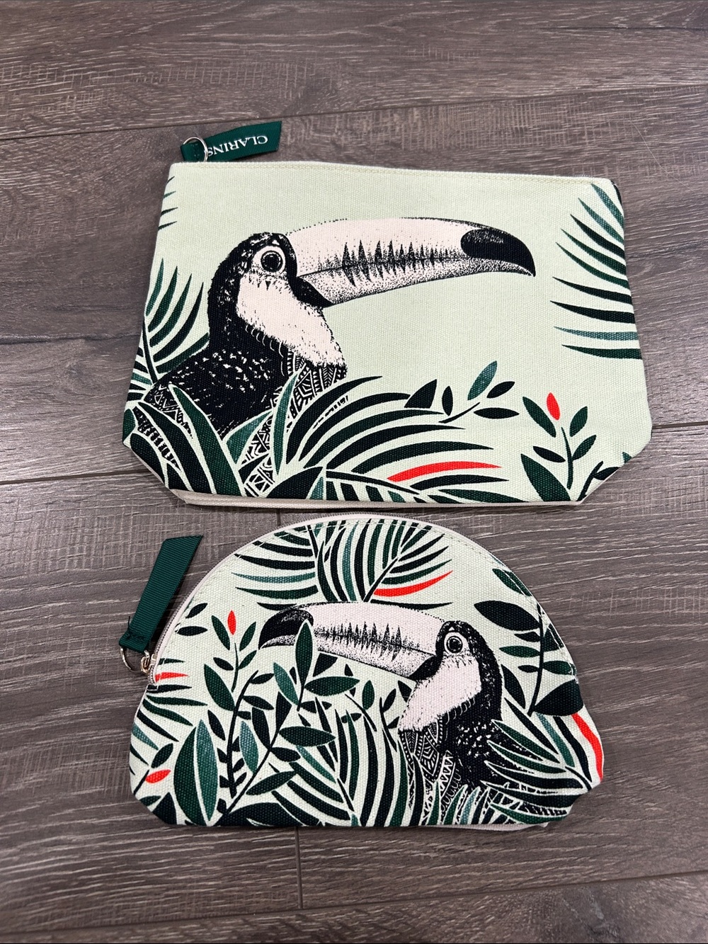 Clarins Tropical Toucan Print Cosmetic Pouch Set in Green, Black, Red